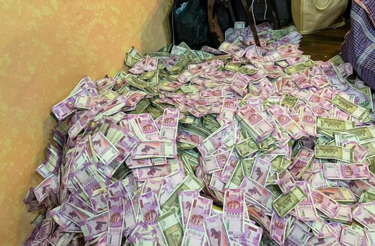  Rs 20 crore cash seized by ED from the premises of an aide of West Bengal minister Partha Chatterjee after the agency conducted raids on Friday
