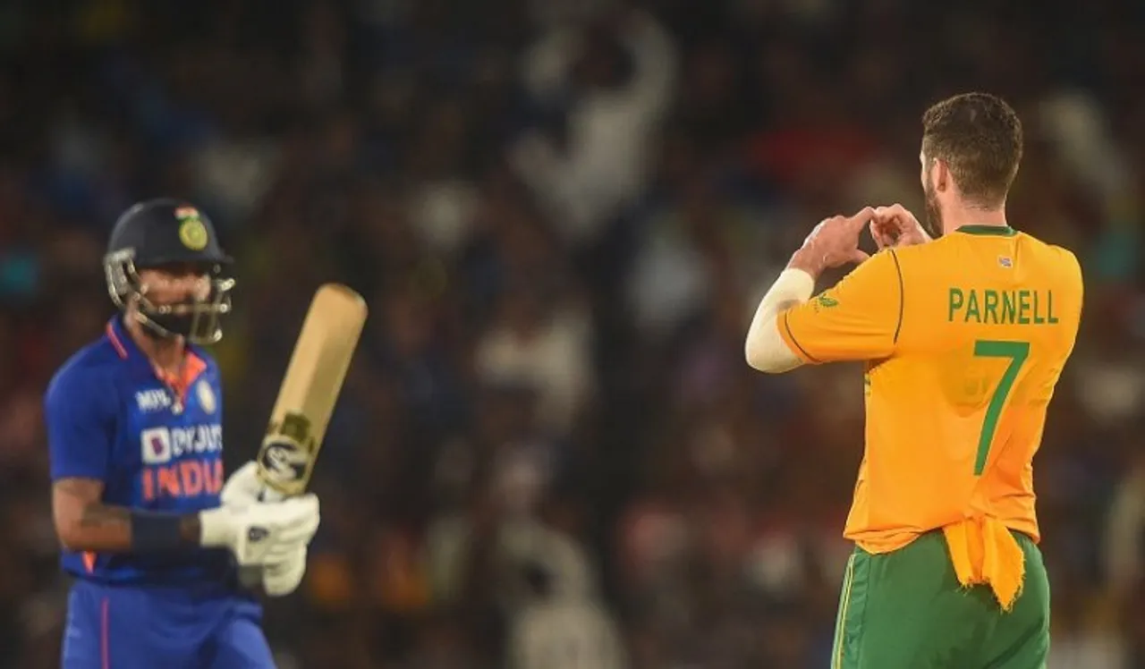 South African bowler Wayne Parnell celebrates the wicket of Indian batsman Hardik Pandya