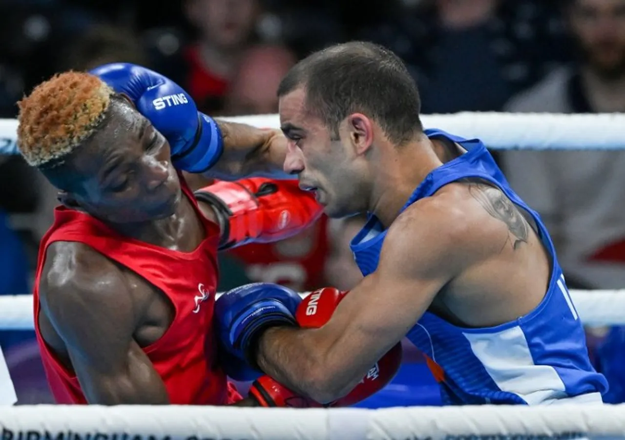 Indias Amit Panghal (blue) and Zambias Patrick Chinyemba during the semi-final match of the men's over 48kg-51kg (Flyweight) boxing event, at the Commonwealth Games 2022