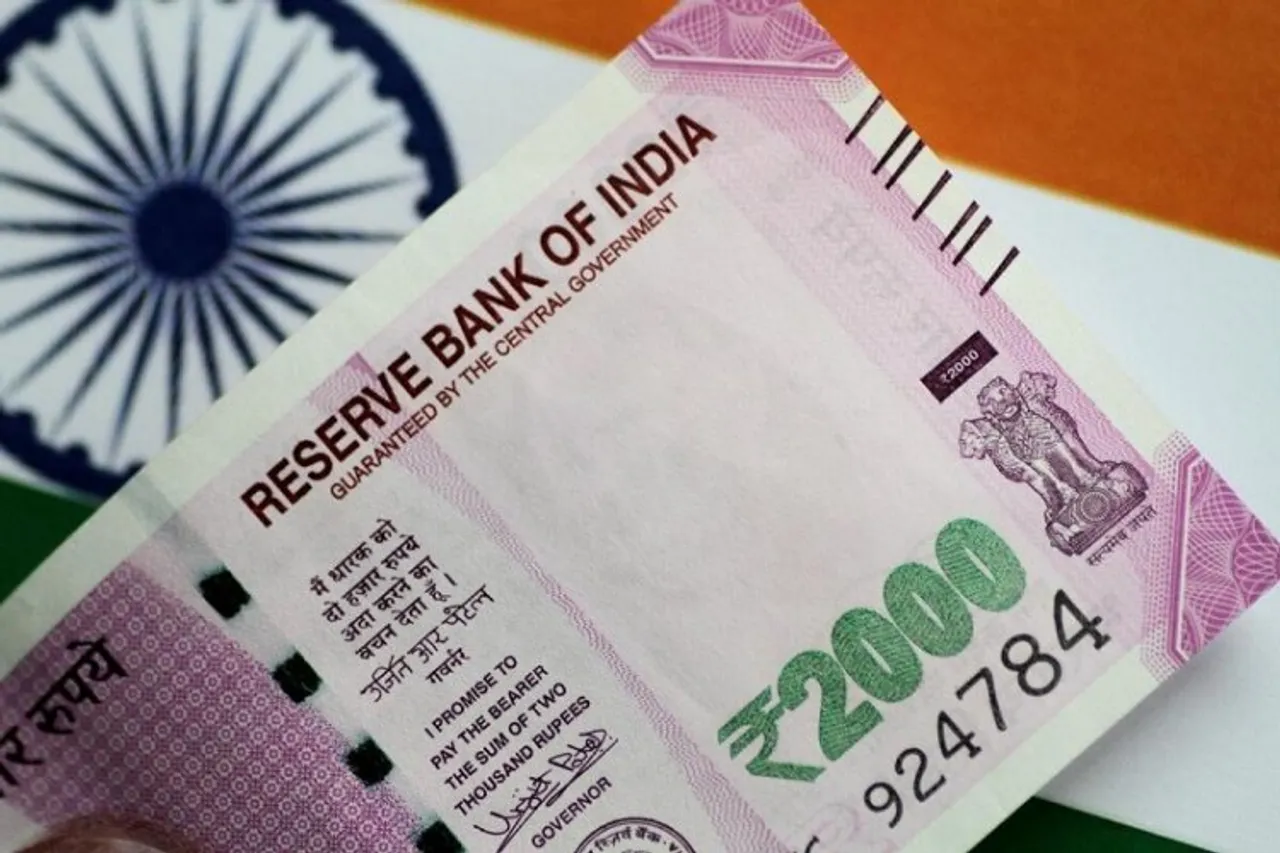 Rupee rises 36 paise to close at 79.17 against US dollar