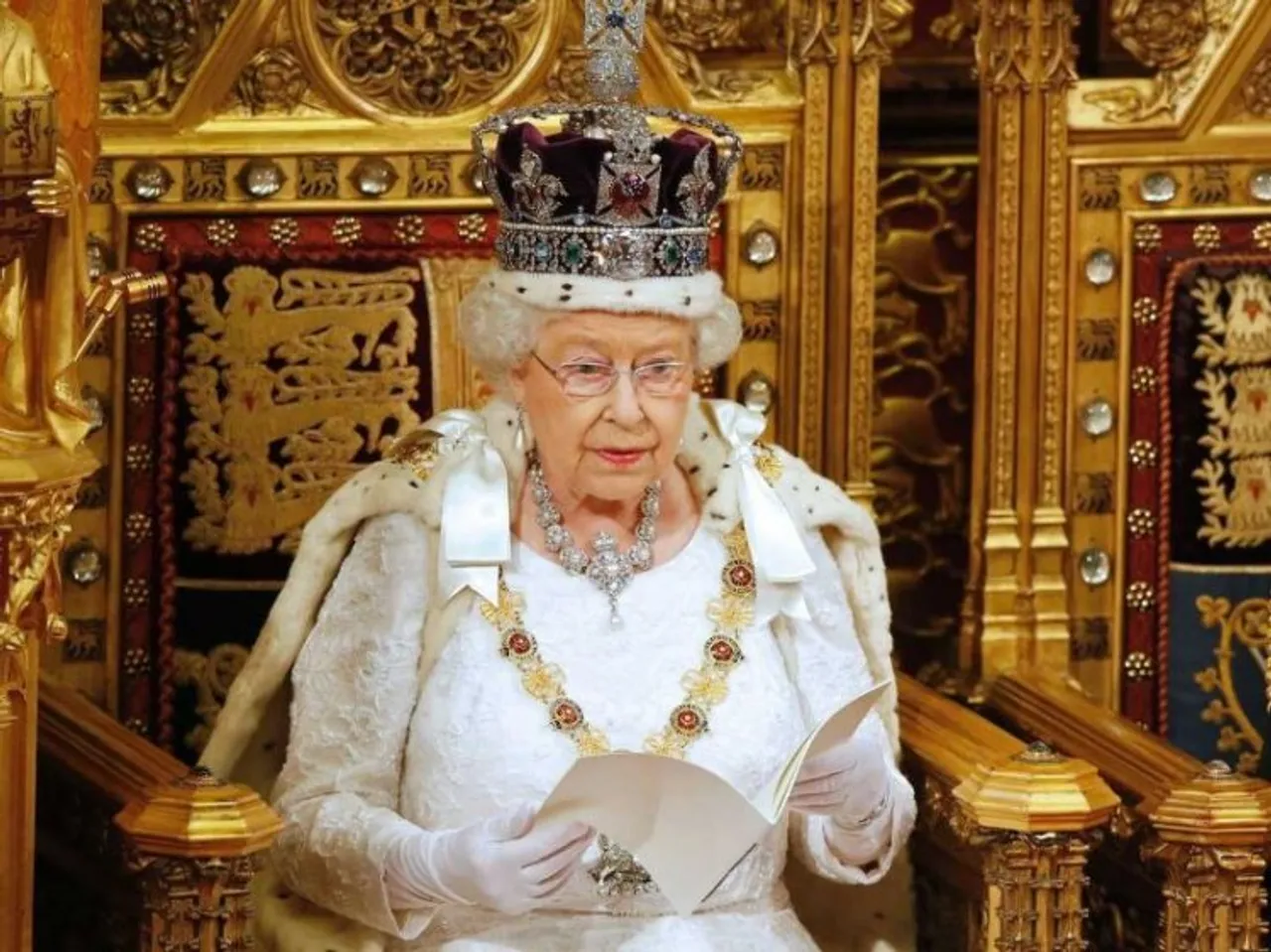 Queen Elizabeth wearing the Royal Crown which has the Kohinoor diamond stolen from India (file photo)