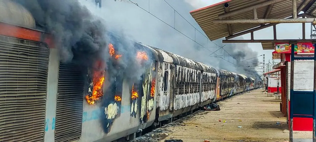 The burning train at Bihar's Lakhisarai Railway Station on Friday