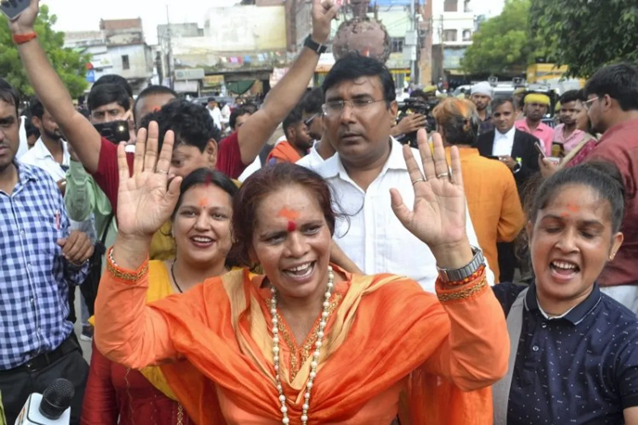 Sadhvi Prachi, a religious leader, celebrates after the district courts verdict in the Gyanvapi mosque-Shringar Gauri case, in Varanasi