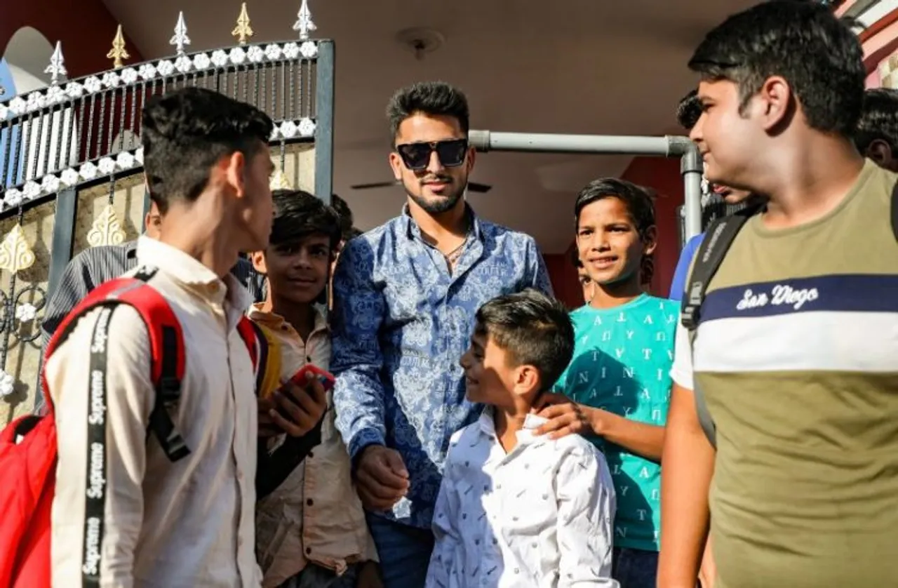 Cricketer Umran malik arrives at his home in Jammu after playing in Indian Premiere League