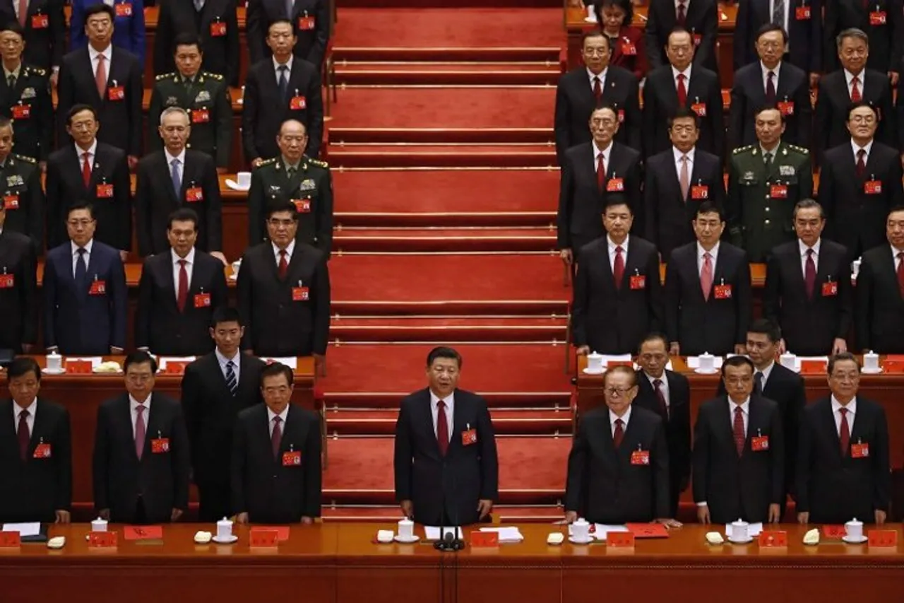 High drama marks closure of China's key Communist Party Congress as ex-president Hu escorted out