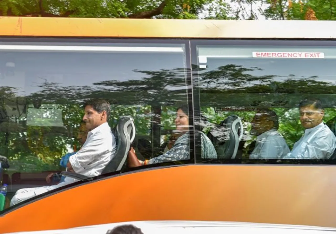 Haryana Congress MLAs and leaders in a bus