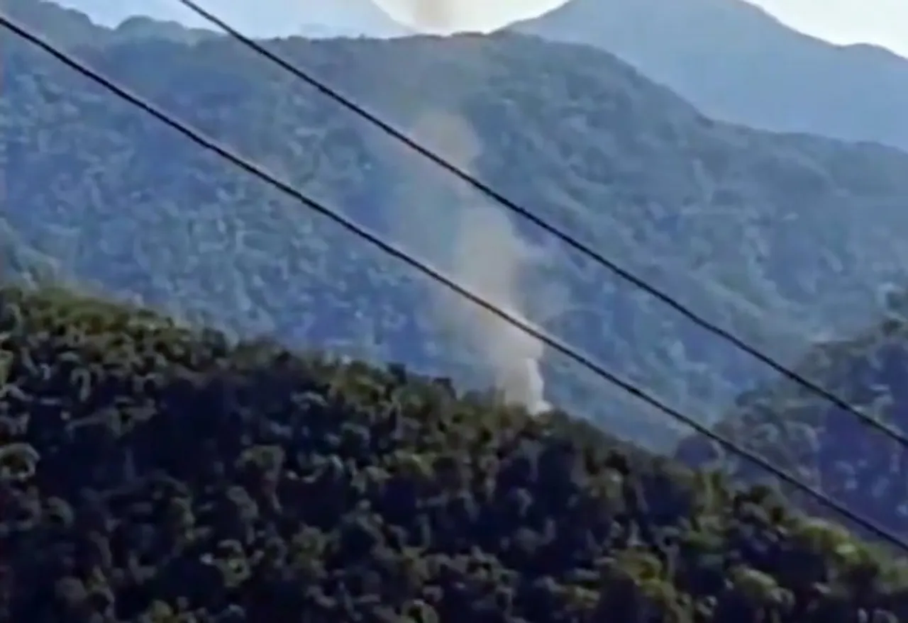 Smoke billows after an advanced light helicopter of the Indian Army crashed at Migging in Upper Siang district of Arunachal Pradesh,