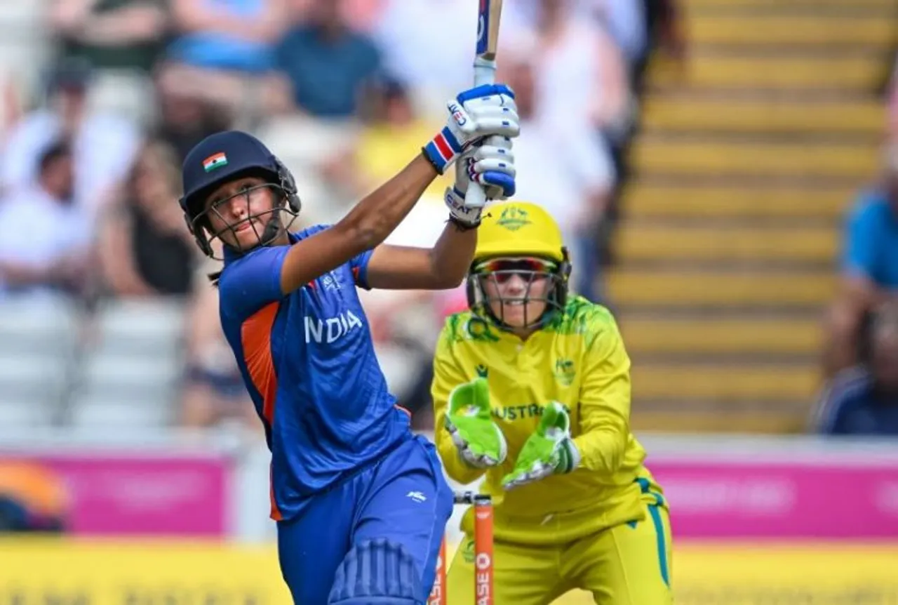  Indian captain Harmanpreet Kaur plays a shot during the Group-A Preliminary Round womens cricket match between India and Australia, at the Commonwealth Games 2022 (CWG)