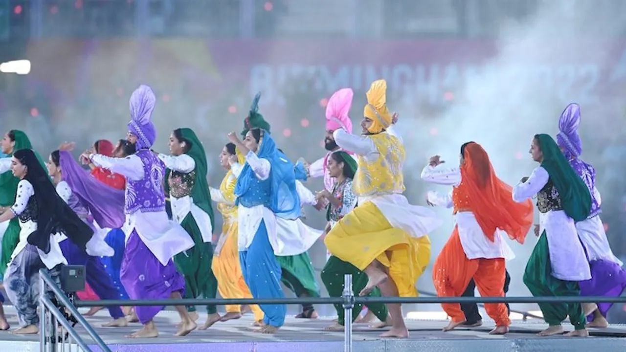 Bhangra artists perform during the closing ceremony of the Commonwealth Games 2022 (CWG), at Alexander Stadium in Birmingham