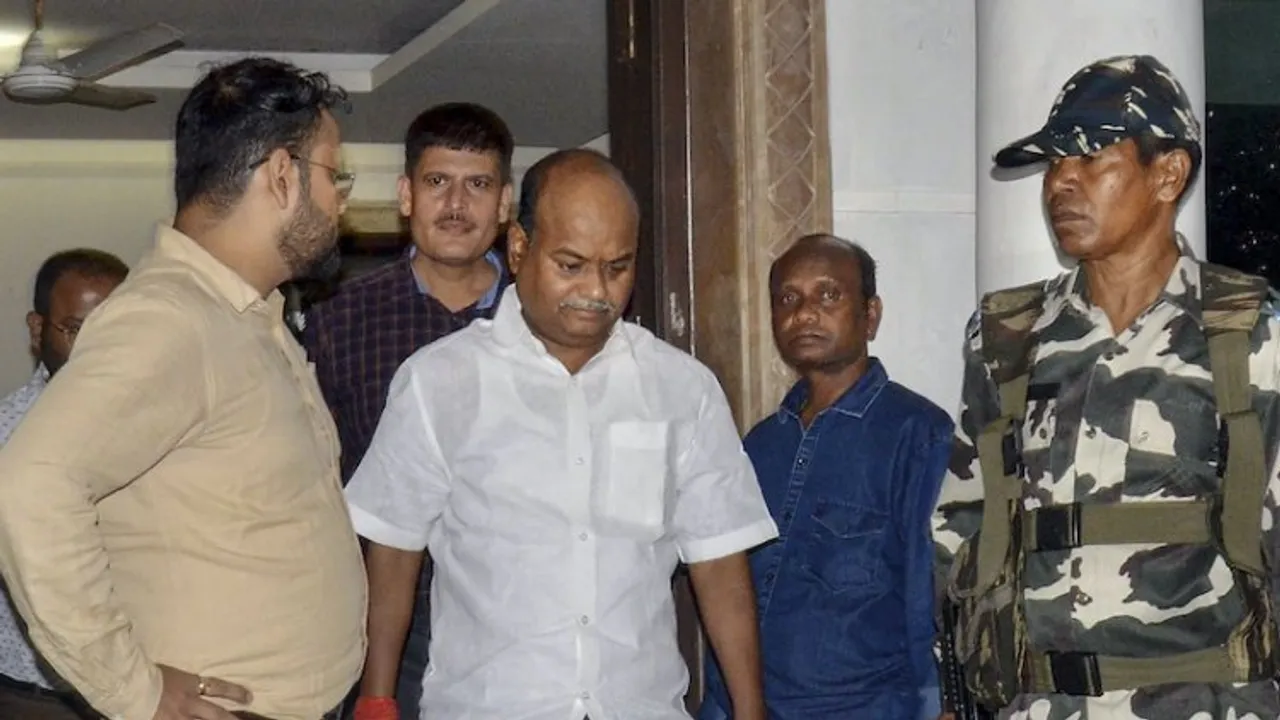 Pankaj Mishra, the political representative of Jharkhand Chief Minister Hemant Soren, being arrested by Enforcement Directorate (ED) officials after questioning in connection with a money laundering case, in Ranchi, Tuesday