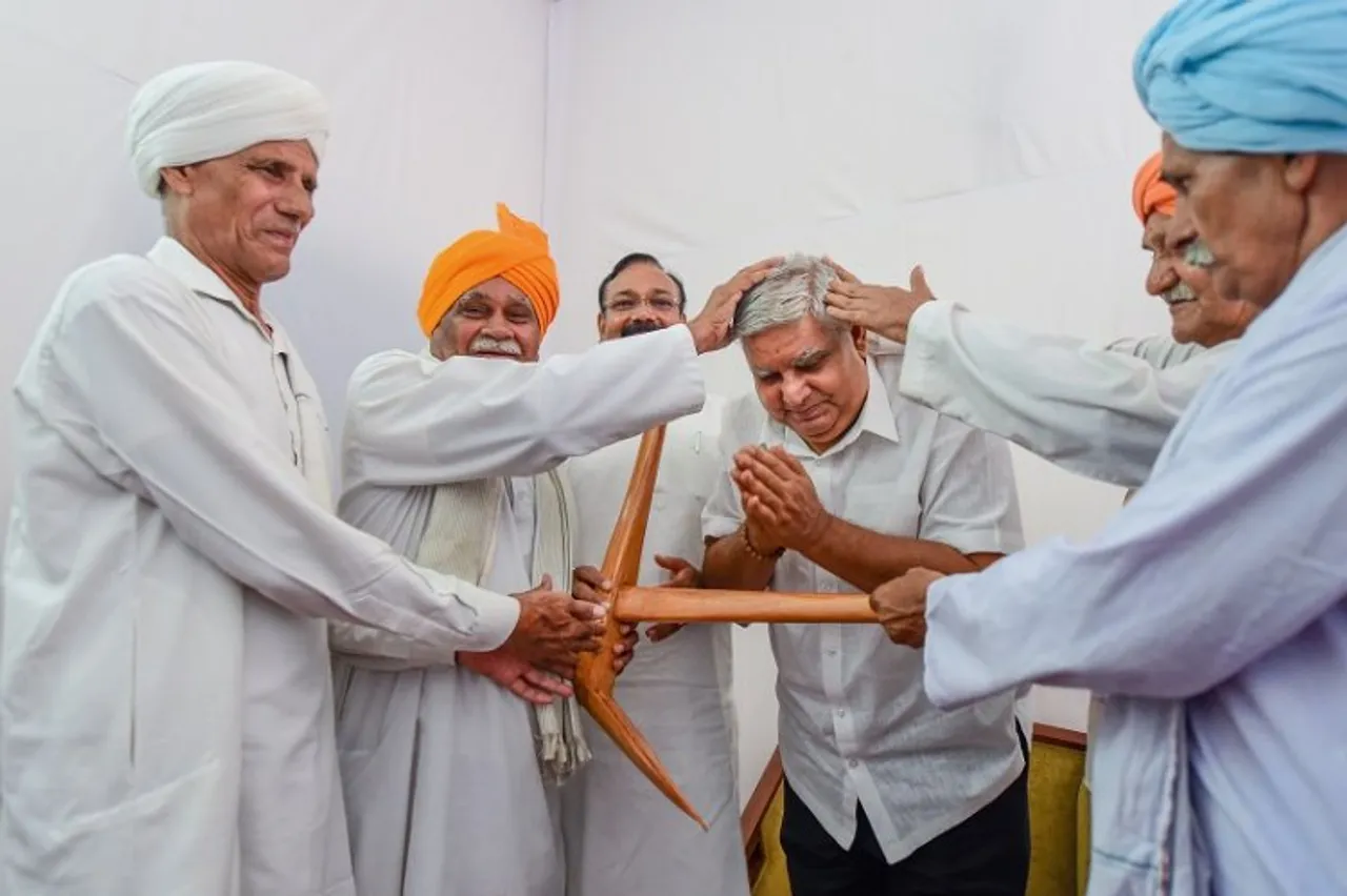 NDA's vice-presidential candidate Jagdeep Dhankhar being greeted by farmer leaders, in New Delhi, Monday