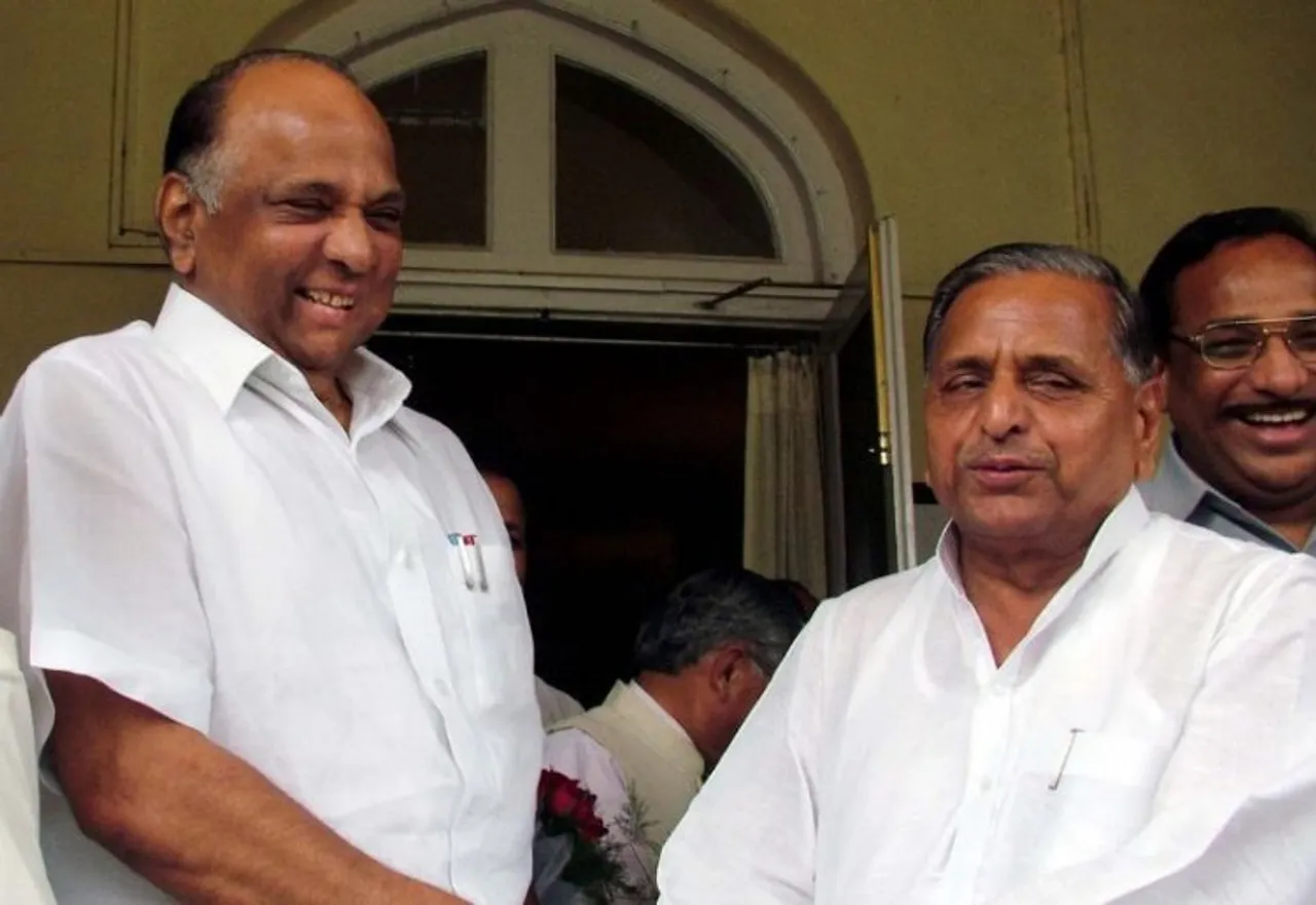 In this file photo dated July 21, 2005, then Uttar Pradesh chief minister Mulayam Singh Yadav with then union minister for agriculture Sharad Pawar at the formers official residence, in Lucknow