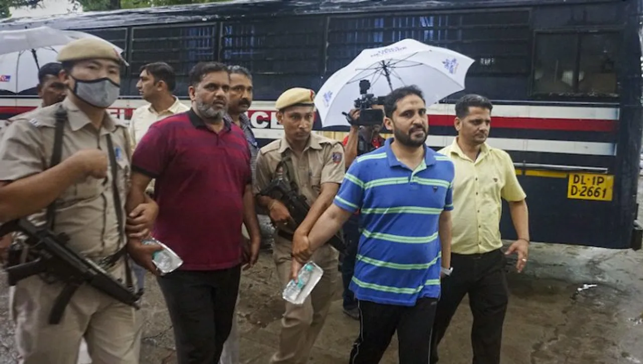 General Secretary of Popular Front of India Anis Ahmed (second, right) being produced to Patiala Court after a nationwide raid spearheaded by the National Investigation Agency (NIA)