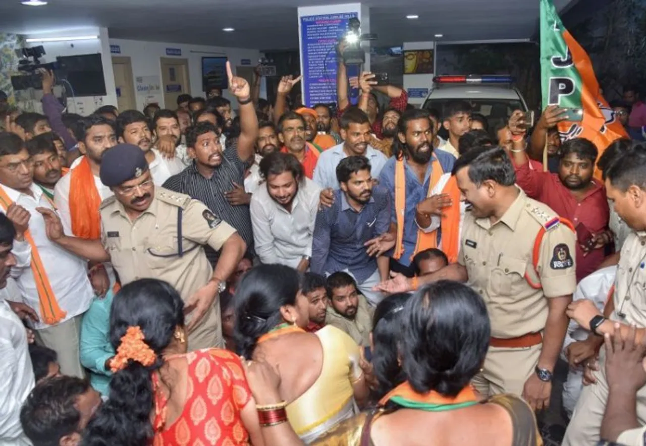BJP workers protest inside the Jubilee Hills police station demanding justice to a teenager