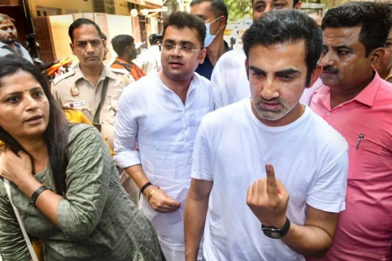 BJP MP Gautam Gambhir comes out of a polling station after casting his vote for Rajinder Nagar Assembly bypoll, in New Delhi