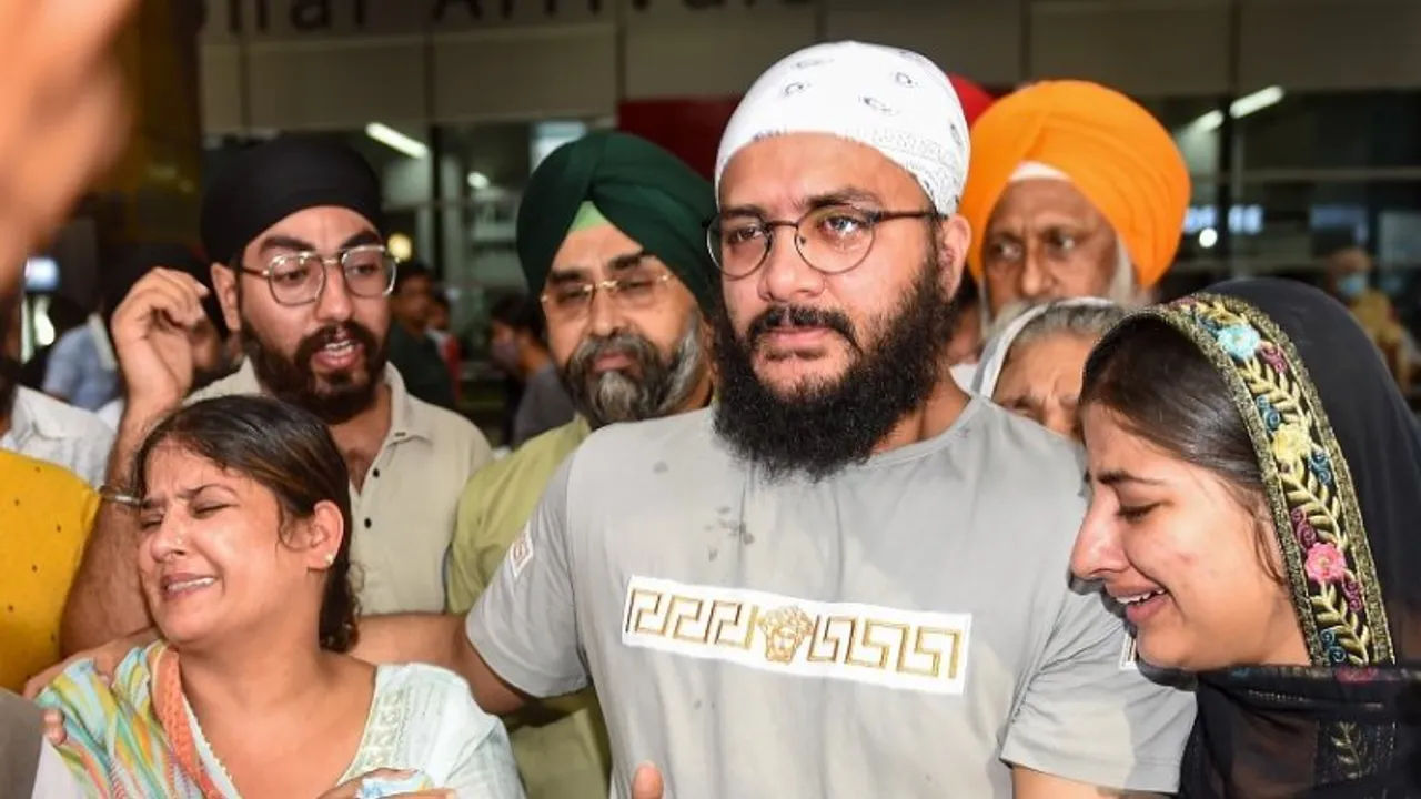 Wife, son and daughter of Sawinder Singh, who was killed in an attack on a gurdwara in Kabul, mourn after his ashes were brought, at IGI Airport, in New Delhi, Thursday, June 30, 2022.