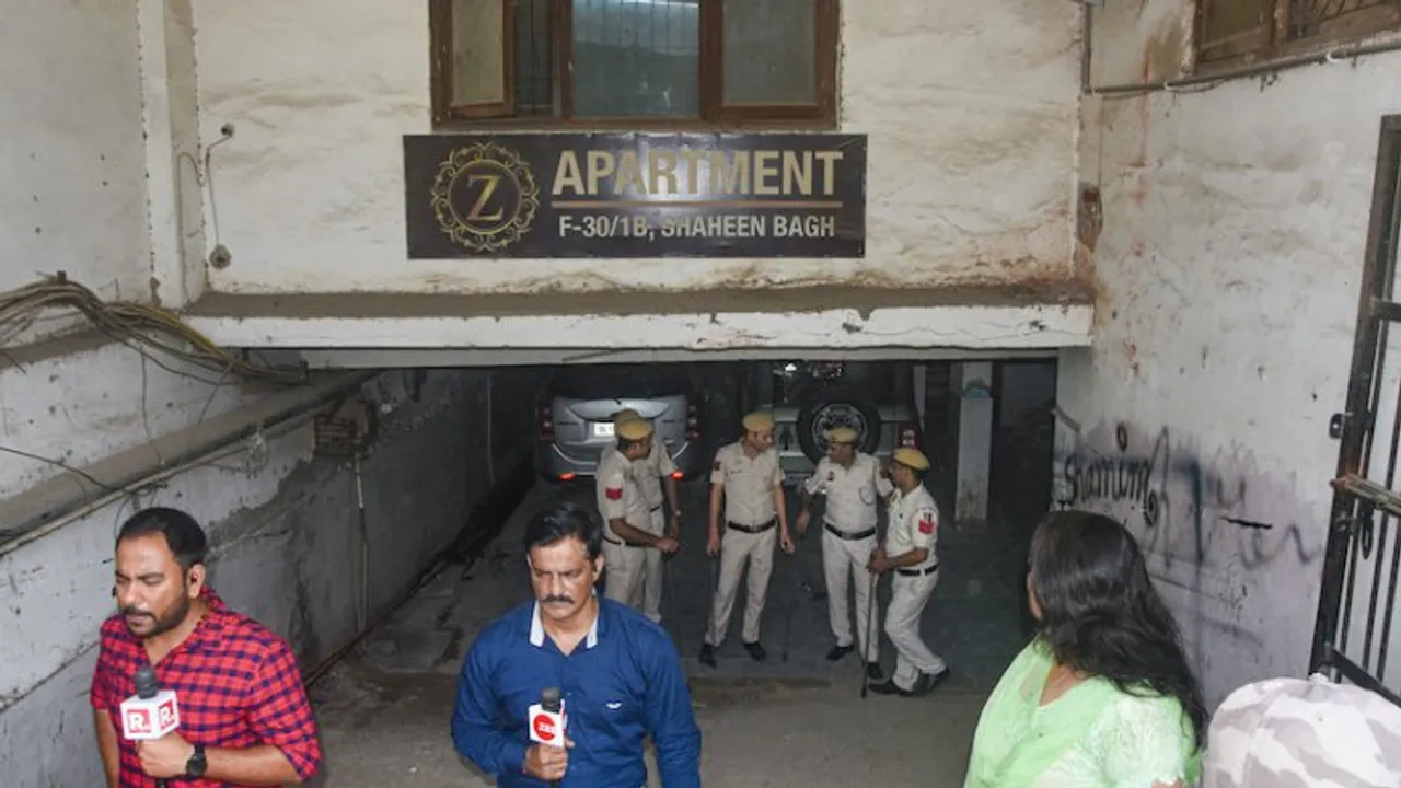 Police personnel deployed at Popular Front of India (PFI) office building, at Shaheen Bagh in New Delhi on Wednesday