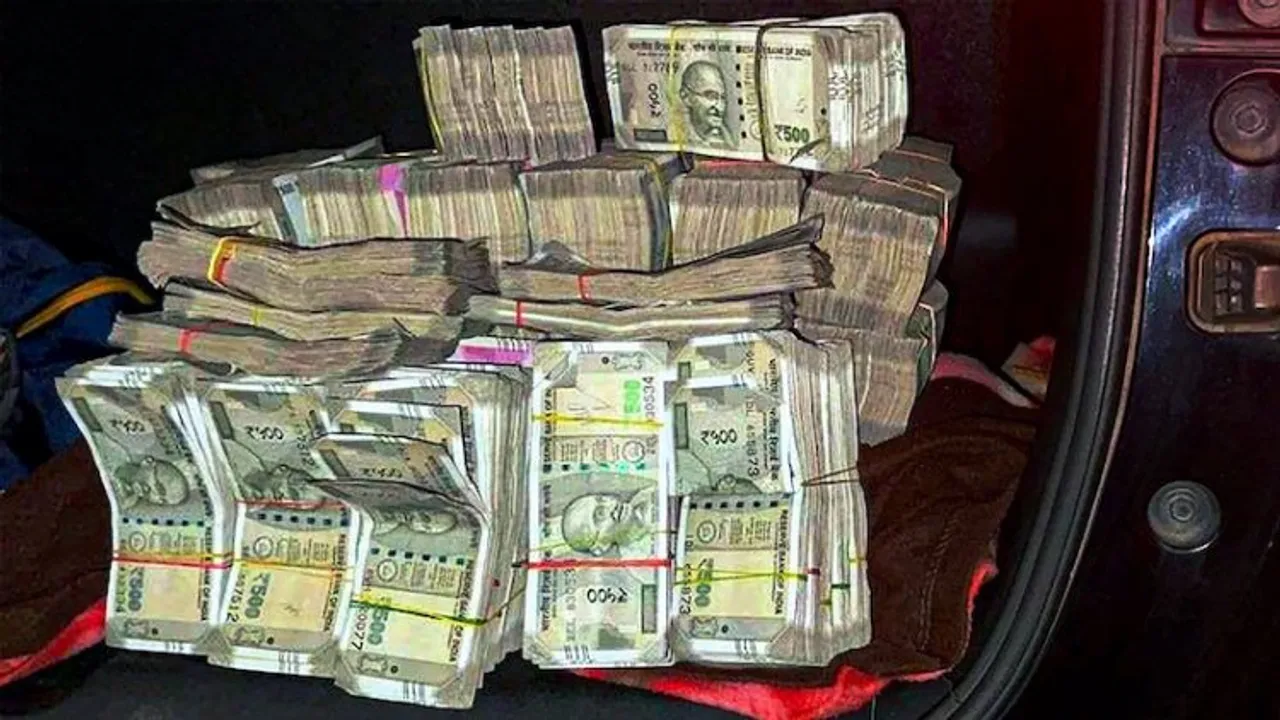 Huge amount of cash which was found in a vehicle in which three Jharkhand Congress MLAs Irfan Ansari, Rajesh Kachhap and Naman Viksal Kongadi, were traveling, at Ranihati in Howrah district, Saturday night