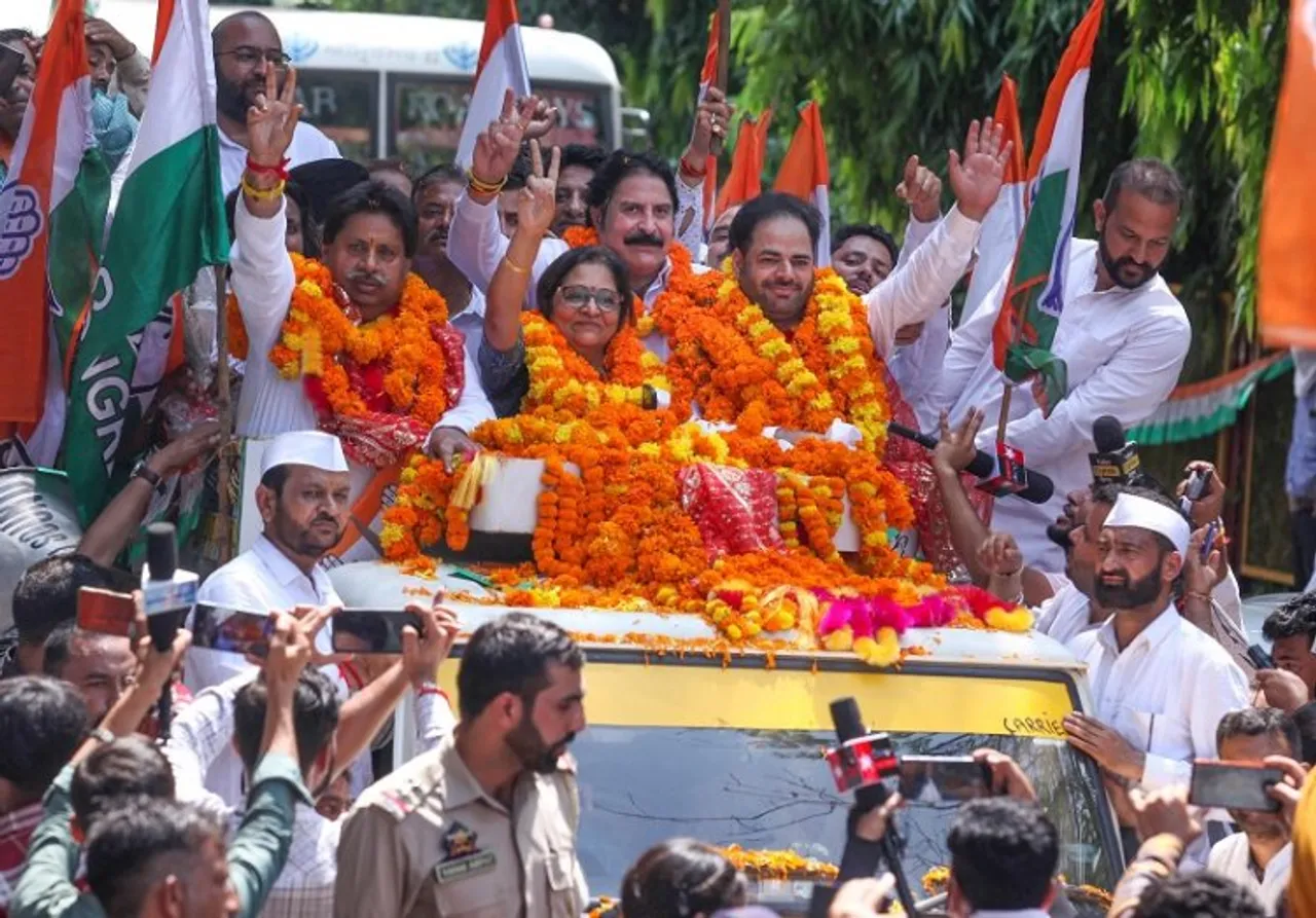 AICC in-charge for J&K Rajani Patil, J&K Congress President Vikar Rasool Wani and J&K Congress Working President Raman Bhalla being welcomed upon their arrival in Jammu