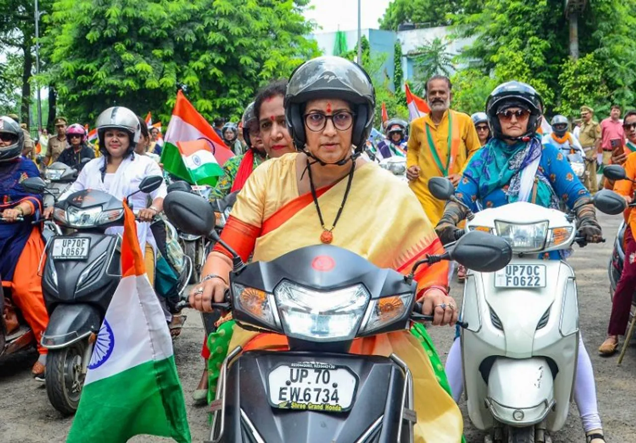 Smriti Irani leading bike rally in Prayagraj