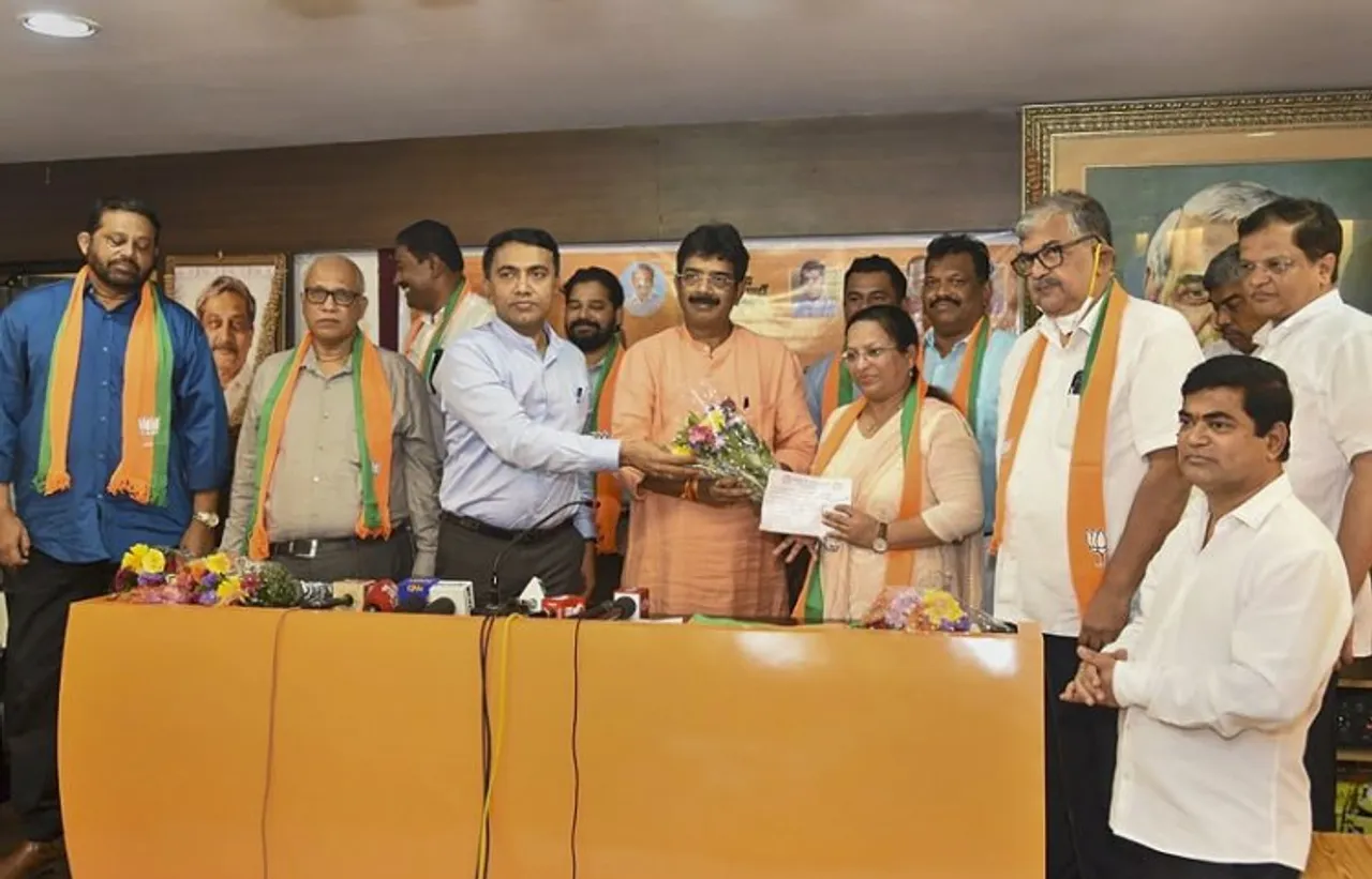 Goa Chief Minister Pramod Sawant and Goa BJP President Sadanand Shet Tanavade welcome eight Congress MLAs who joined the party, in Panaji, Wednesday, Sept. 14, 2022