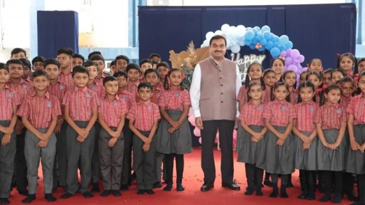 Gautam Adani celebrating his 60th birthday with school children
