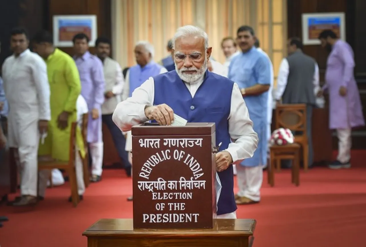 Prime Minister Narendra Modi casts his vote at Parliament