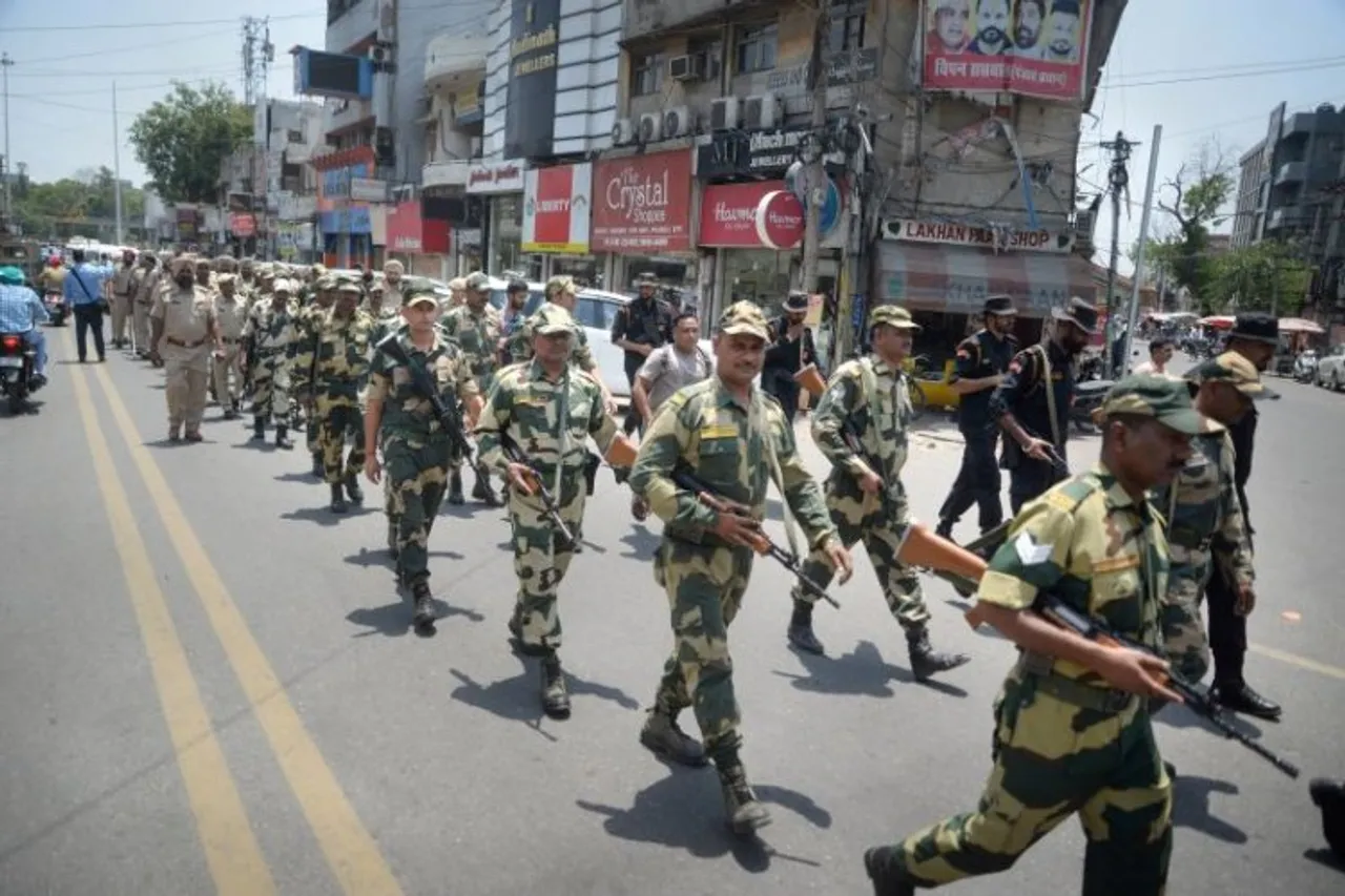 Security personnel hold a flag march, ahead of the anniversary of Operation Blue Star