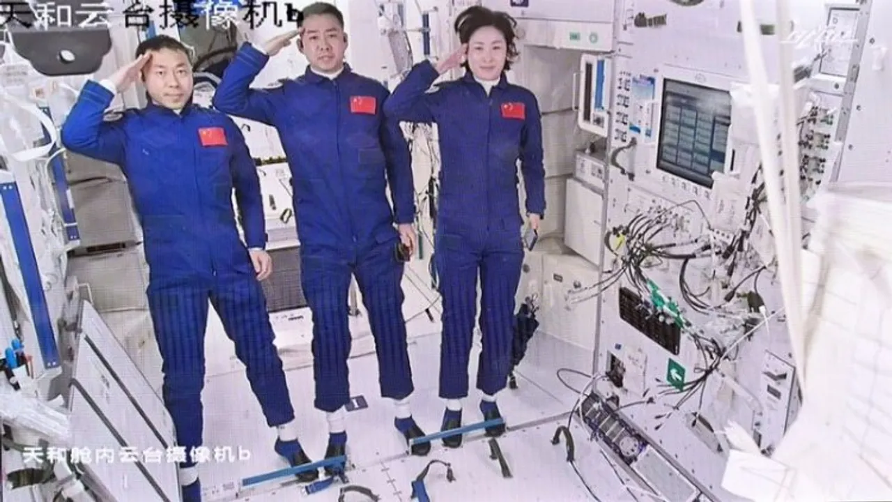 (Left to Right) Shenzhou-14 taikonauts Cai Xuzhe, Chen Dong and Liu Yang   made a salute to the motherland and Chinese compatriots on earth after the third crew of China's Space Station entered the Tianhe core module 
