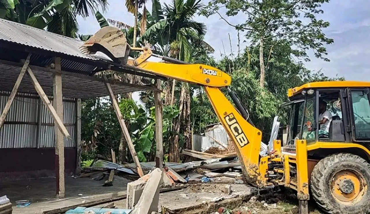  Authorities demolish Jamiul Huda madrasa of Mustafa alias Mufti Mustafa, who was recently arrested for his links with a Bangladesh-based terror outfit, at Moirabari in Morigaon district of Assam