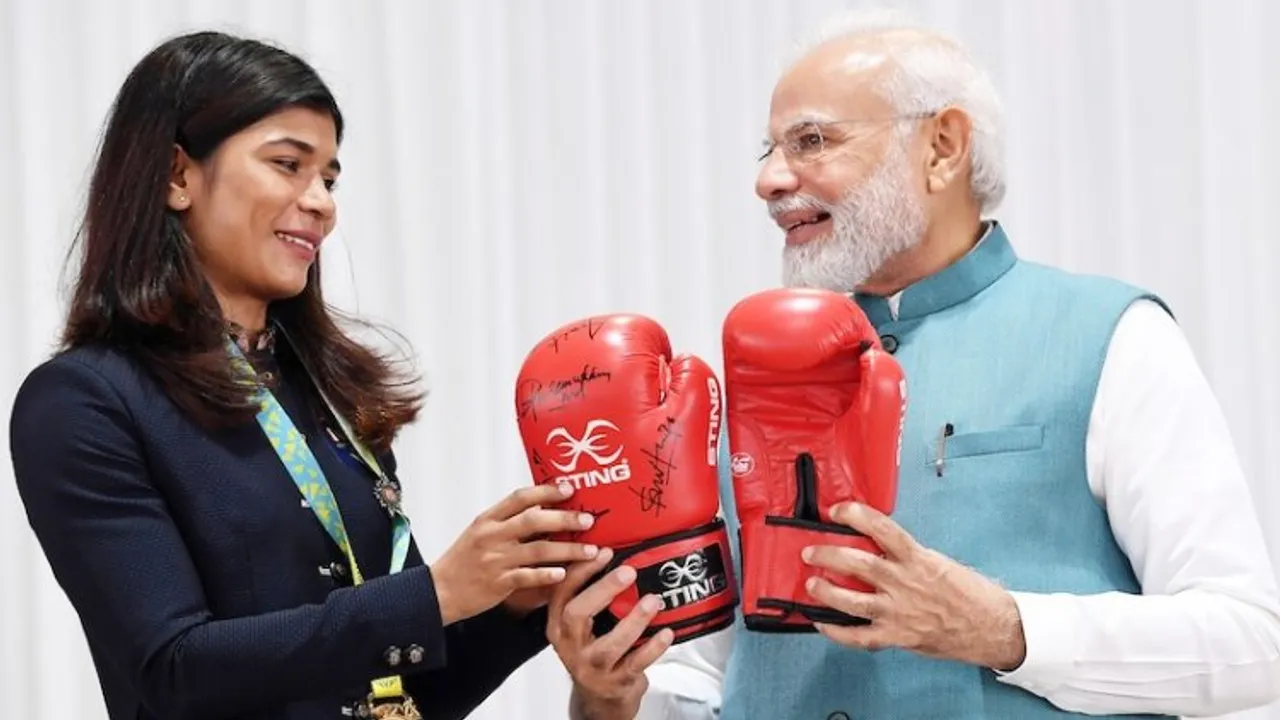 Prime Minister Narendra Modi with boxer Nikhat Zareen during the felicitation ceremony of the Indian contingent for the Commonwealth Games 2022, in New Delhi, Saturday