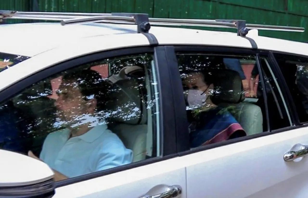 Congress President Sonia Gandhi with party leader Rahul Gandhi leaves from her residence to appear before the Enforcement Directorate for questioning in connection with the National Herald case, in New Delhi