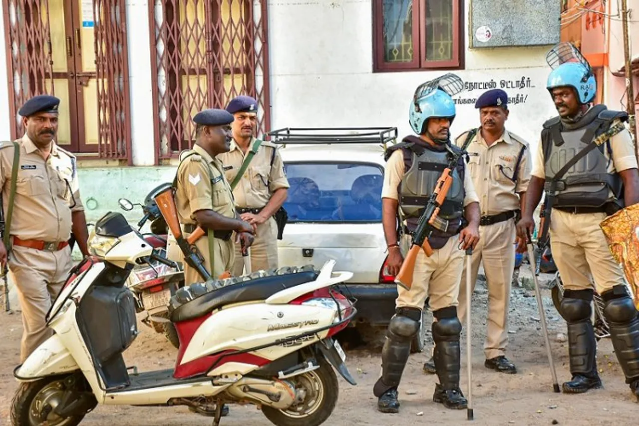 Police personnel during a raid of National Investigation Agency (NIA) at the residence of a functionary of Popular Front of India (PFI), in Madurai