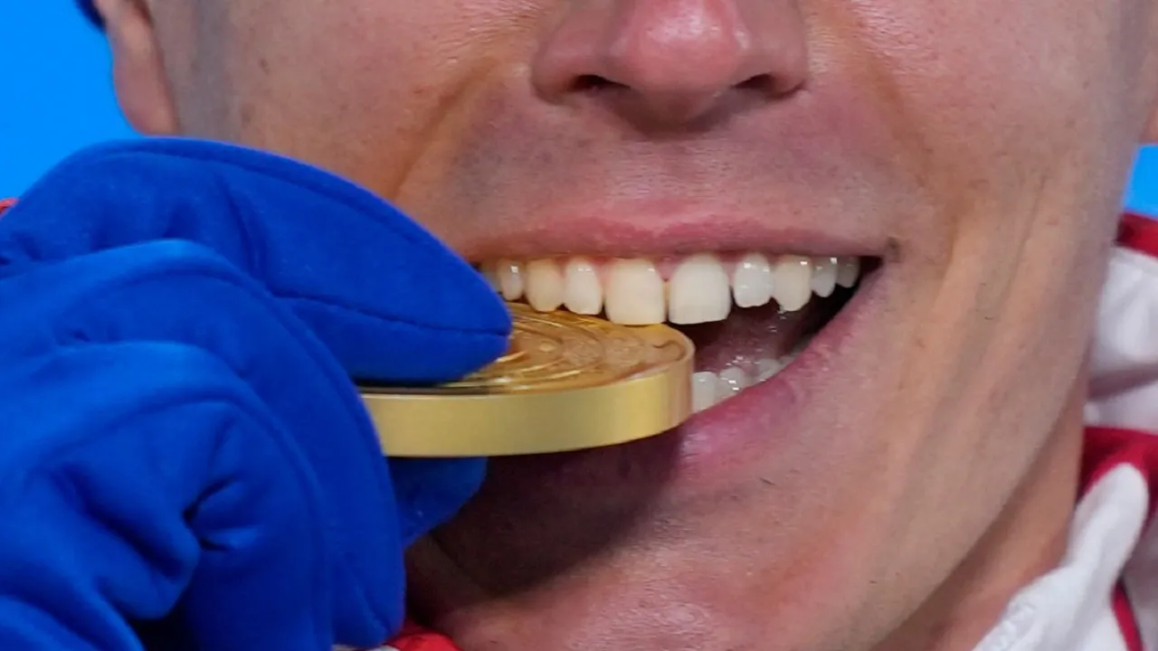 Why Do Players Bite Their Medals With Their Teeth reason