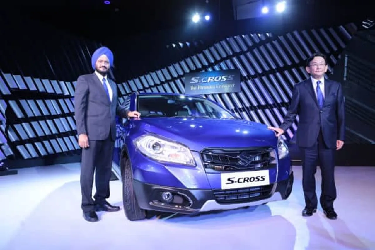 Kenichi Ayukawa MD CEO right along with R S Kalsi ED MS Maruti Suzuki India launch S CROSS Indias first premium crossover