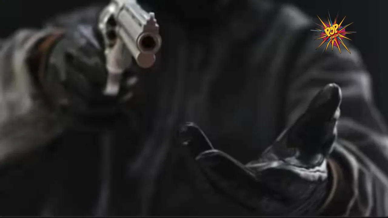 at gunpoint