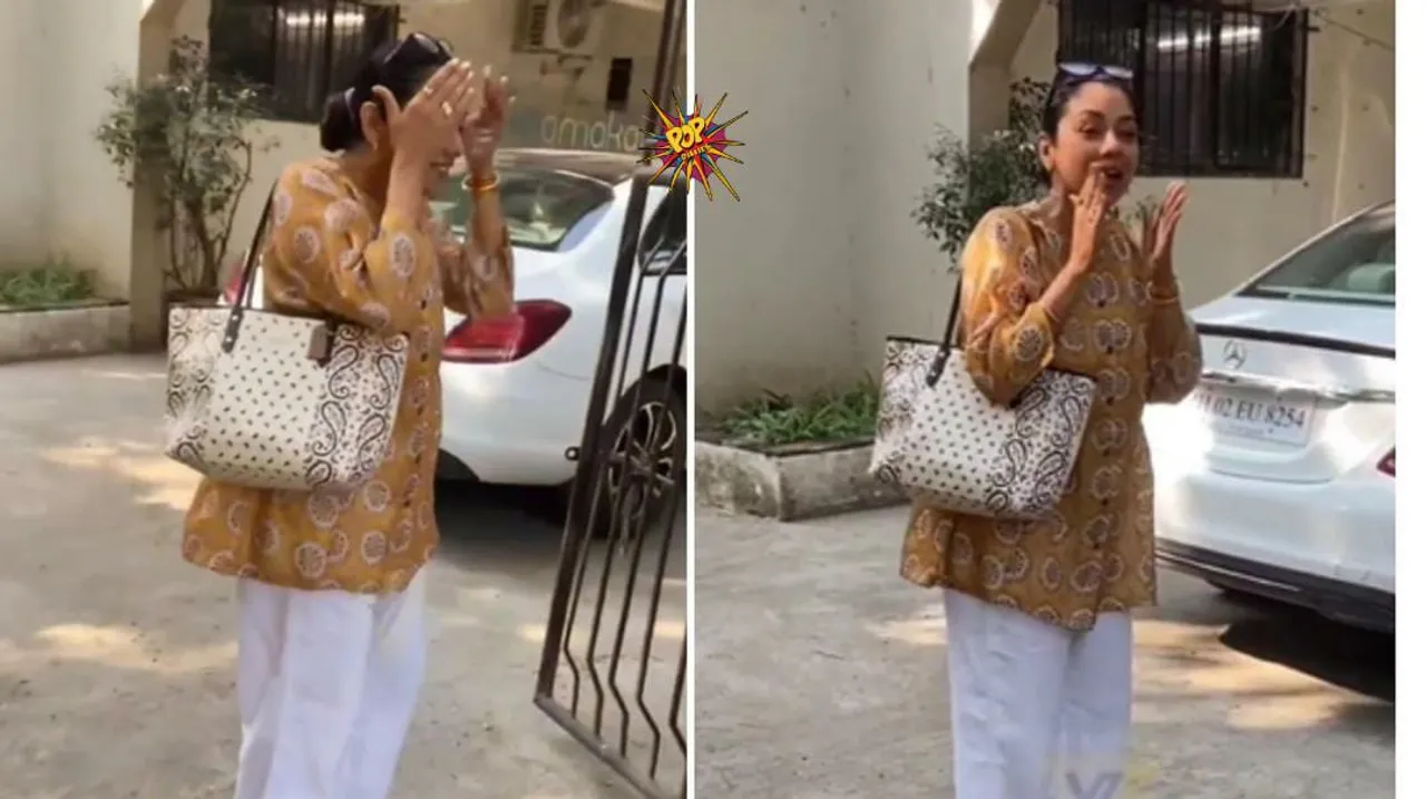 Rupali Ganguly requests paps to wait as she had oil in her hair.