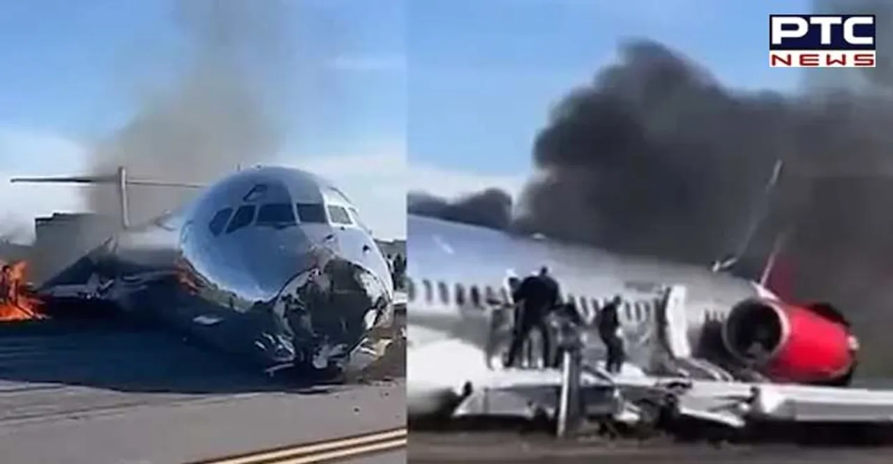 US: Plane carrying 126 people catches fire after crash landing