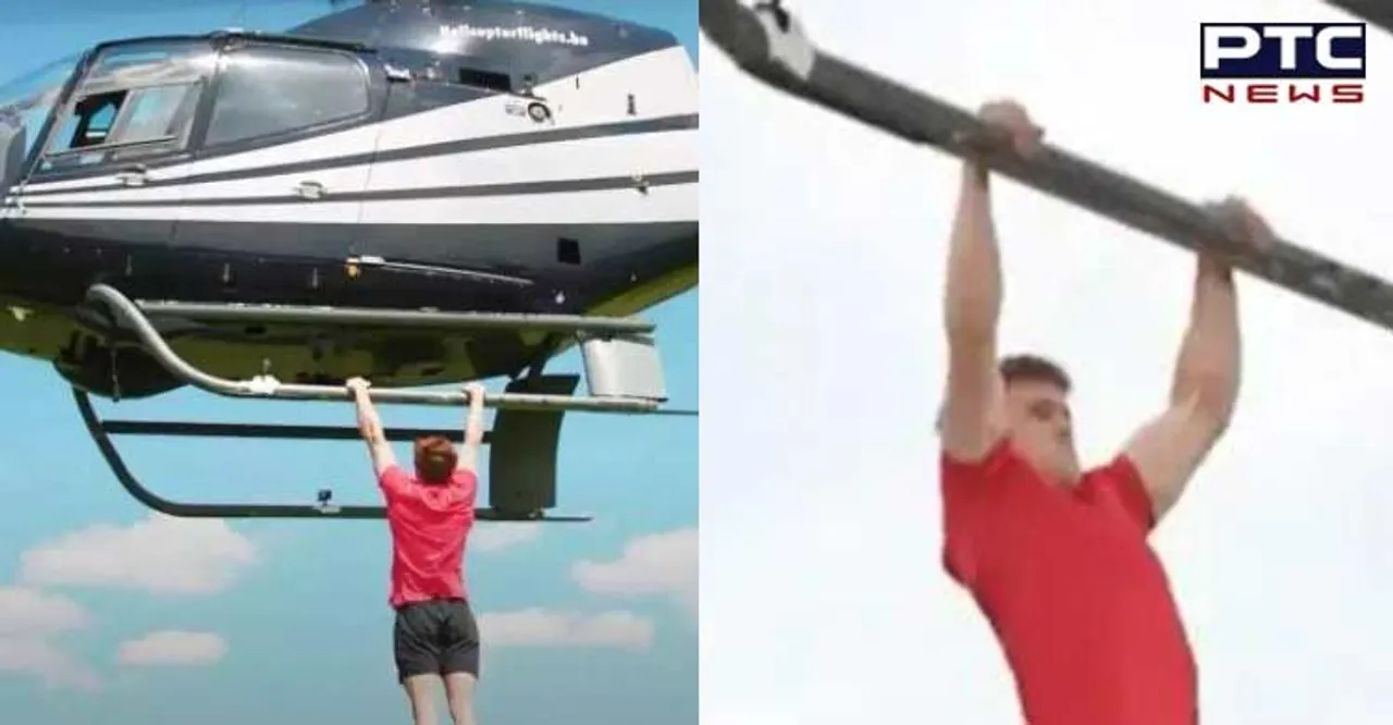 YouTubers smash Guinness World Record by doing 25 pull-ups from helicopter in a minute