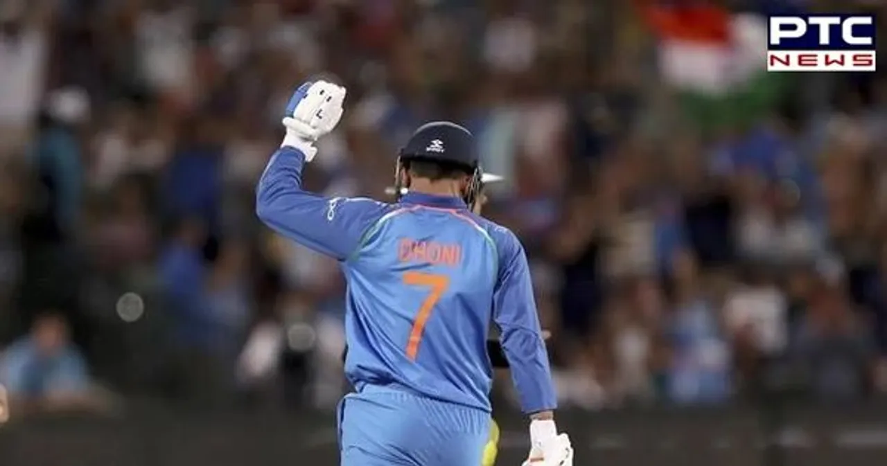 MS Dhoni interacts with Indian players after win over England in 2nd T20I