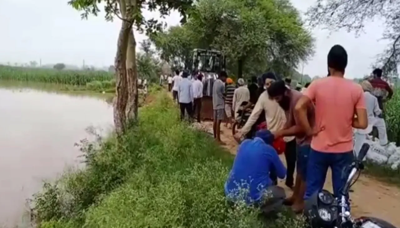 मारकंडा नदी पर बनाया तटबंध विवादों में, ग्रामीणों ने सिंचाई विभाग को घेरा