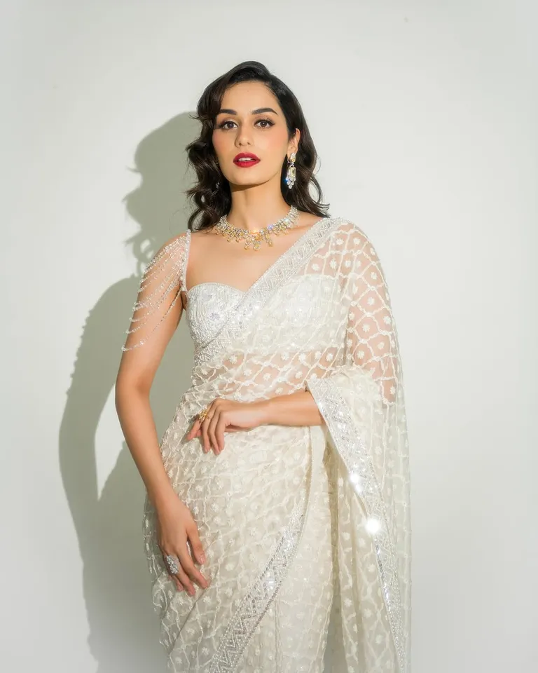 Manushi dazzling in white saree