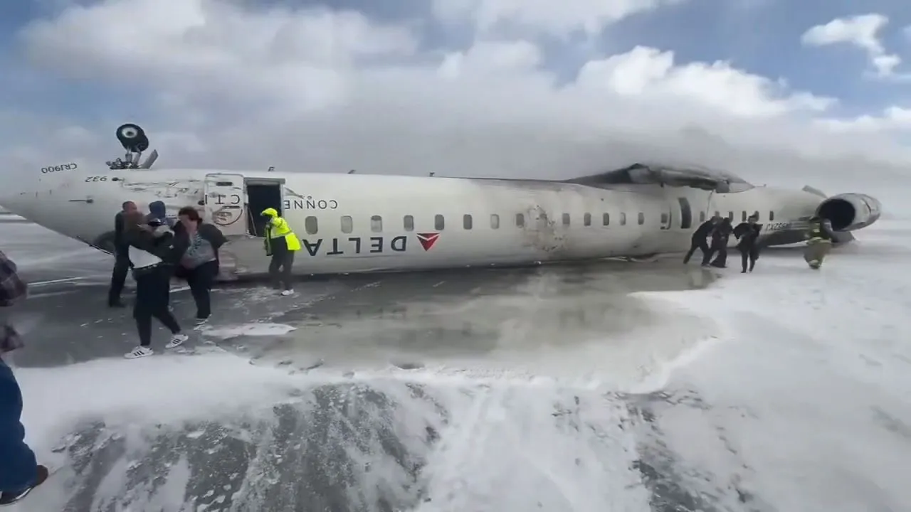 Delta jet flips upside down on a snowy Toronto runway and all 80 aboard survive