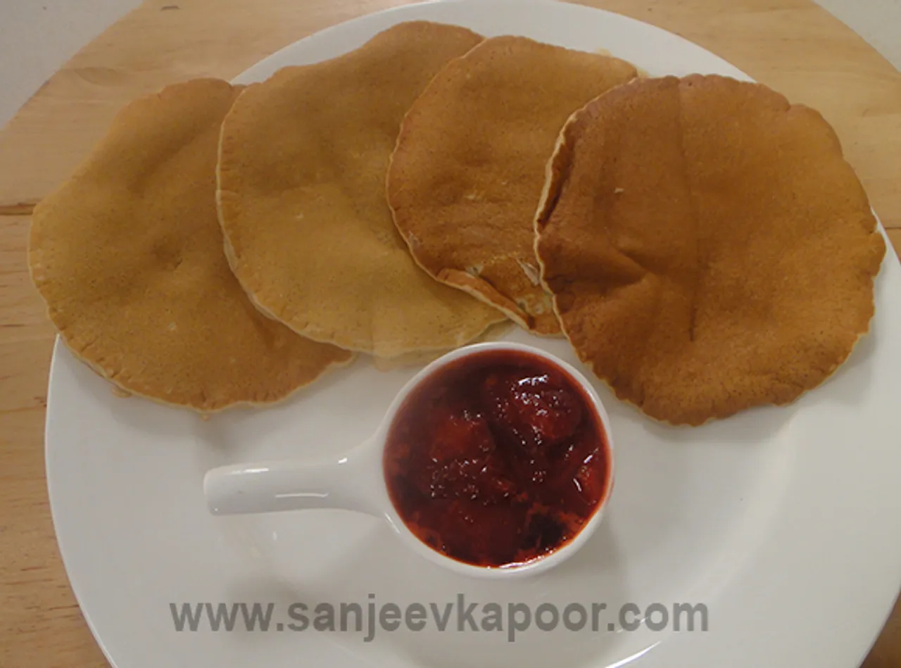 Cinnamon and Vanilla Pancakes with Poached Strawbe