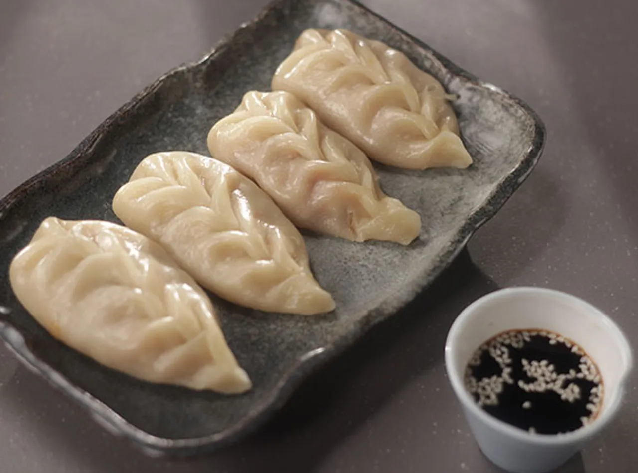 Chicken Schezwan Momos - SK Khazana