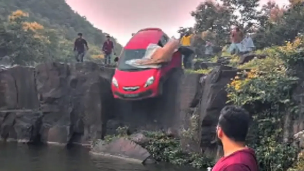 cars-falls-into-waterfall.jpeg