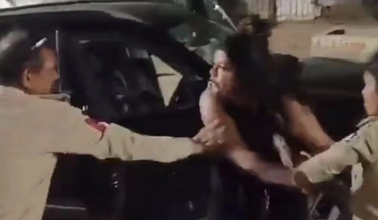 Drunk Woman In Vadodara Abuses And Attacks Cops Image Credit: Reddit