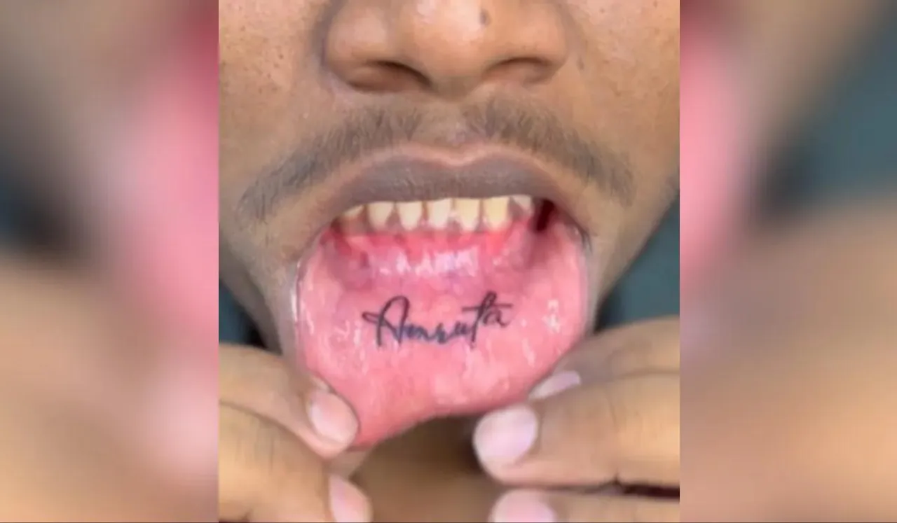 Watch: Man Tattoos Girlfriend's Name Inside Lower Lip, Internet Is Shocked