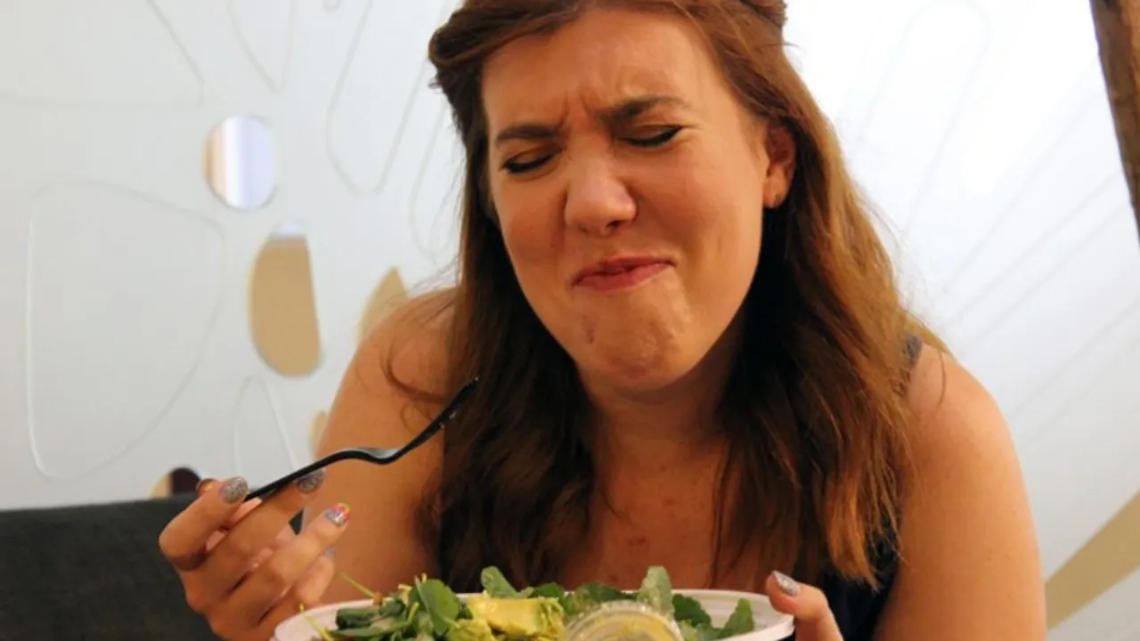 woman finds finger in salad