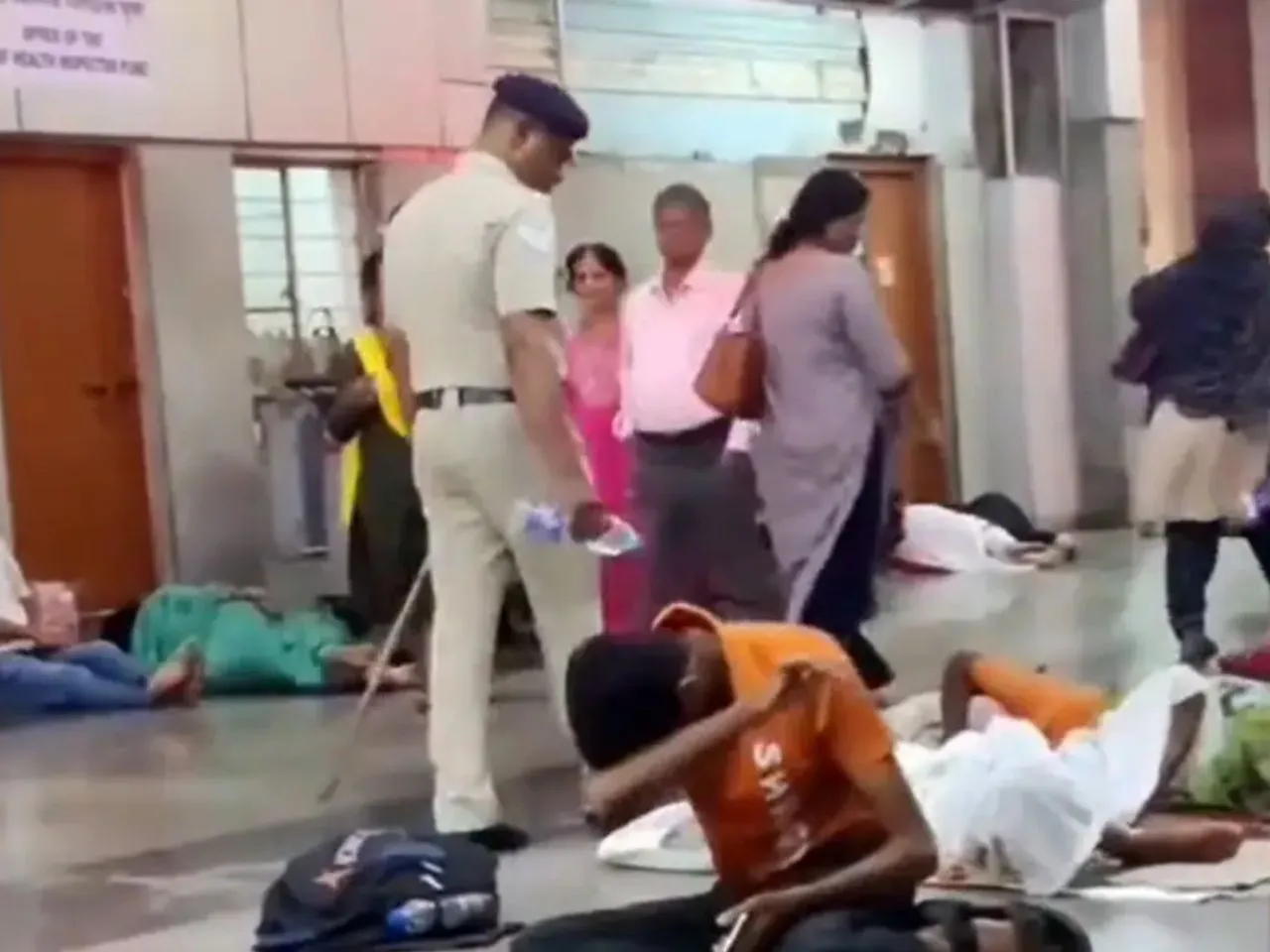 Officer Splashes Water On People Sleeping At Platform, Faces Rebuke